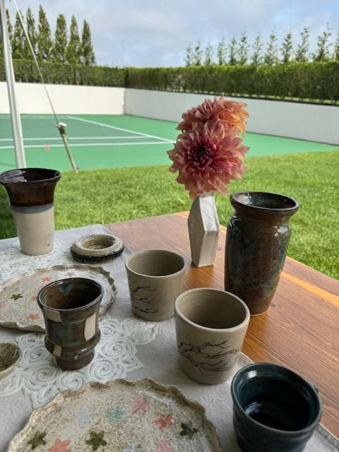 Pottery display on outdoor table