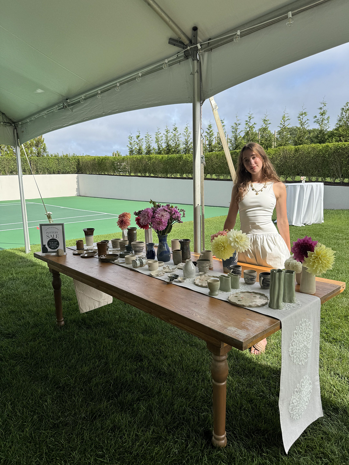 Edie Steinberg at her Holiday House East Hampton pottery display