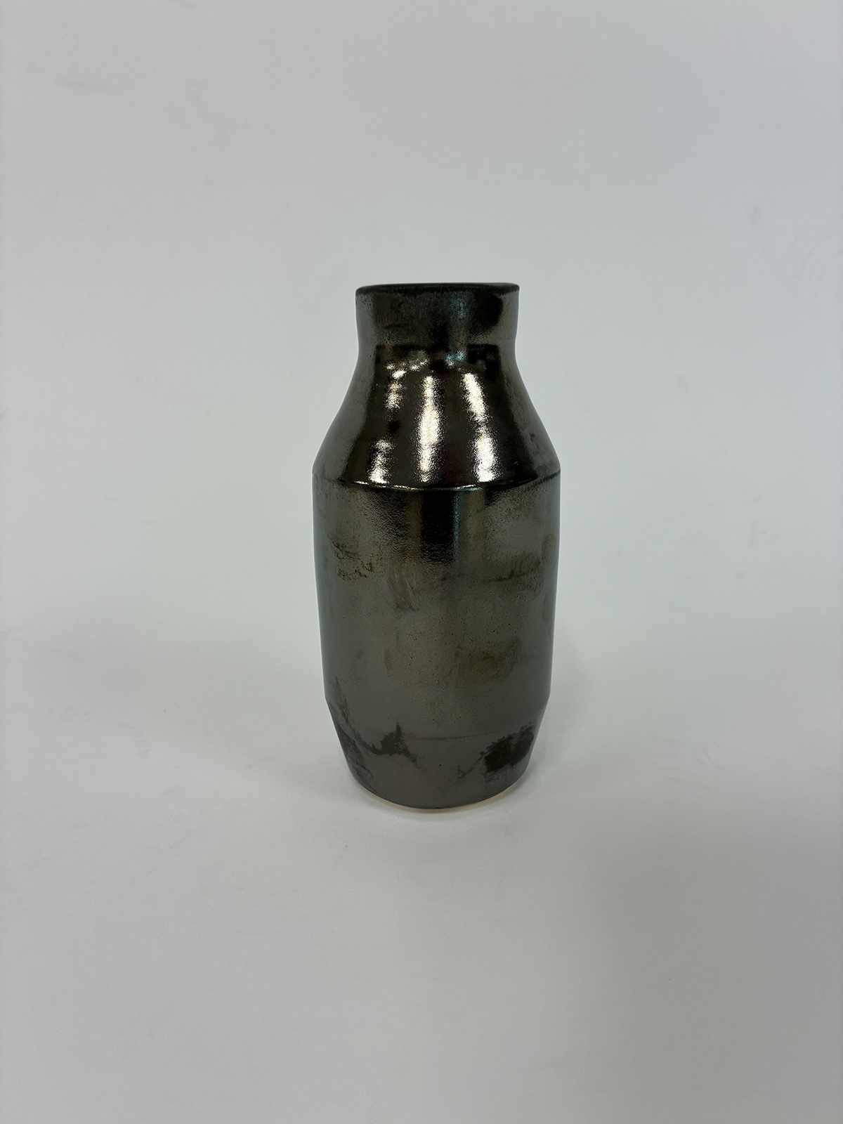 Fools Metal — cylindrical bottle